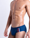DC2 Imperial Blue Swim Briefs — side view highlighting contoured front pouch and modern athletic cut.