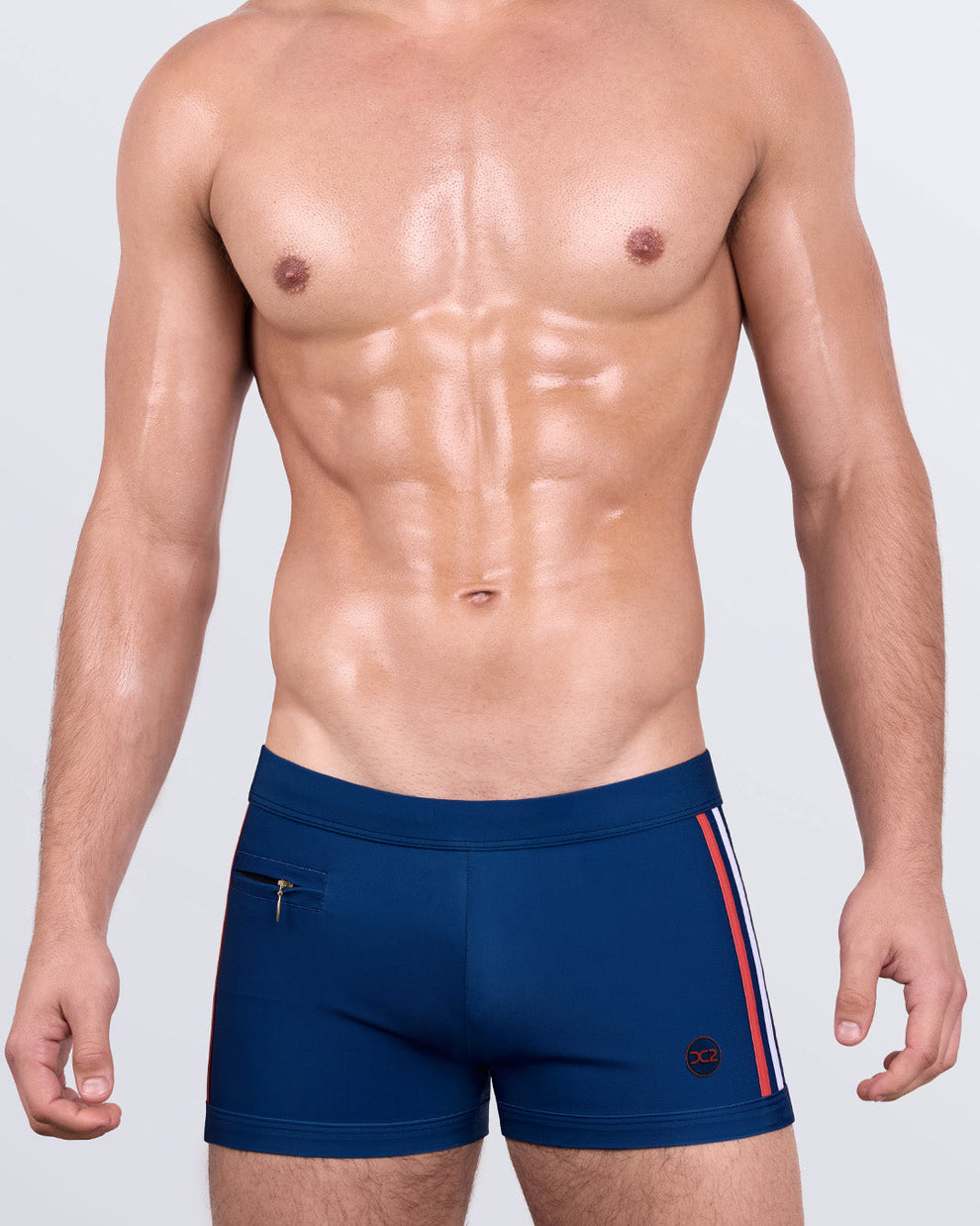 DC2 IMPERIAL BLUE Swim Trunks — front view highlighting bold red and white side stripes and athletic fit waistband.