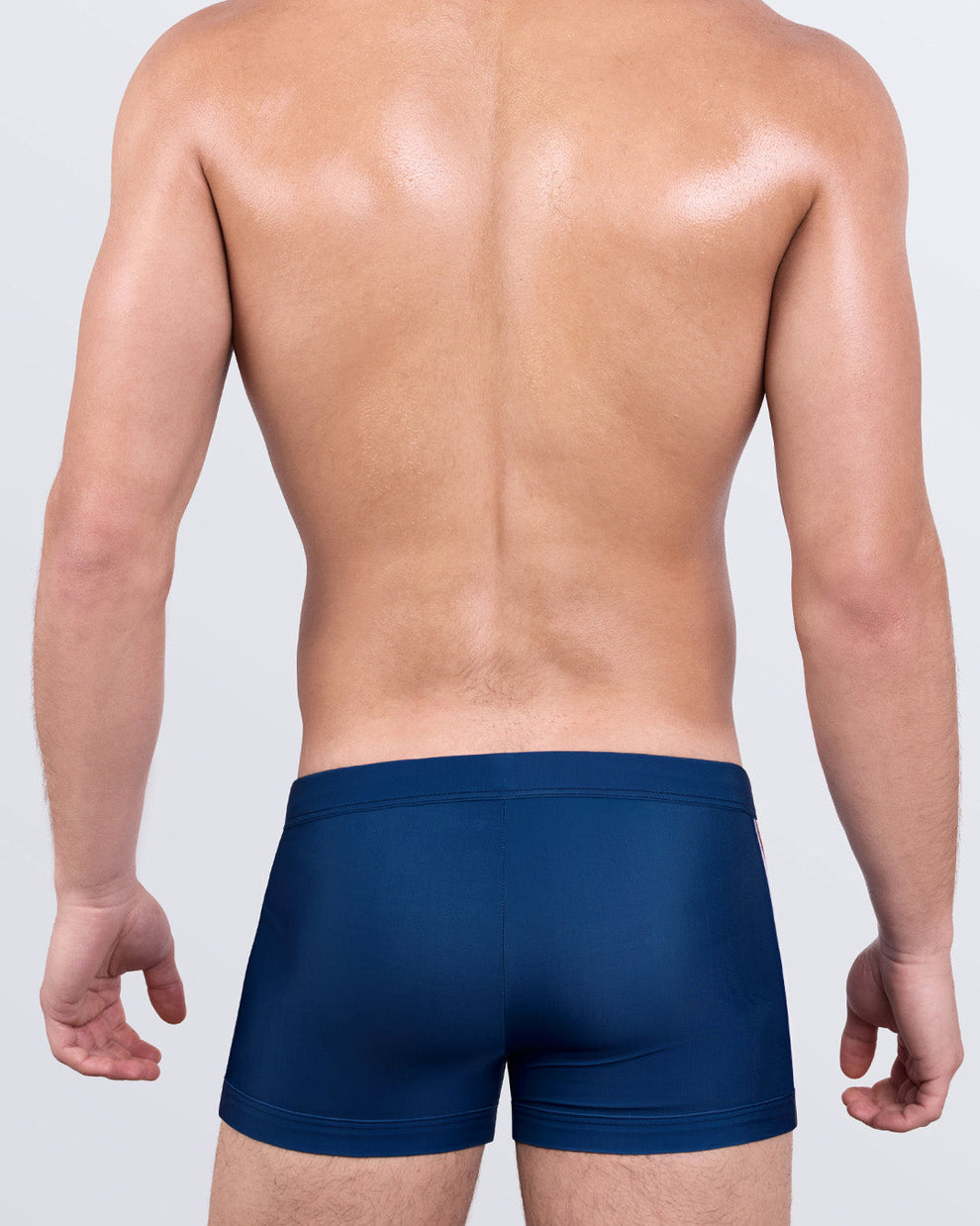 DC2 IMPERIAL BLUE Swim Trunks — back view showing form-fitting silhouette and smooth finish of quick-dry fabric.