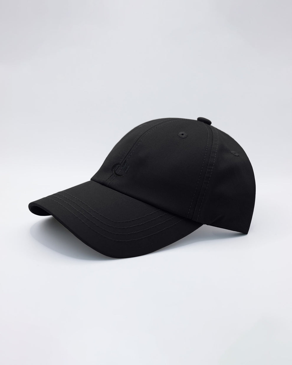 DC2 White Resort Cap — angled view emphasizing tonal embroidery, curved brim, and everyday streetwear fit.