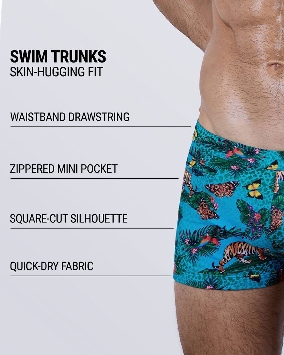 JUNGLE BOOGIE swim trunks for men with design highlights: skin-hugging fit, quick-dry fabric, zippered side pocket, square-cut silhouette, and bold tropical jungle artwork for standout summer swimwear.