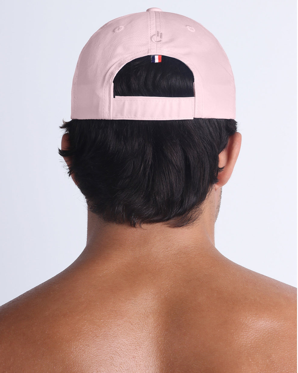 DC2 Resort Cap in Leisure Pink — back view showing the low-profile fit and smooth cotton twill finish.