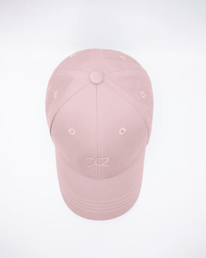 DC2 Leisure Pink Resort Cap — top view highlighting the six-panel construction, stitched seams, and breathable eyelets.