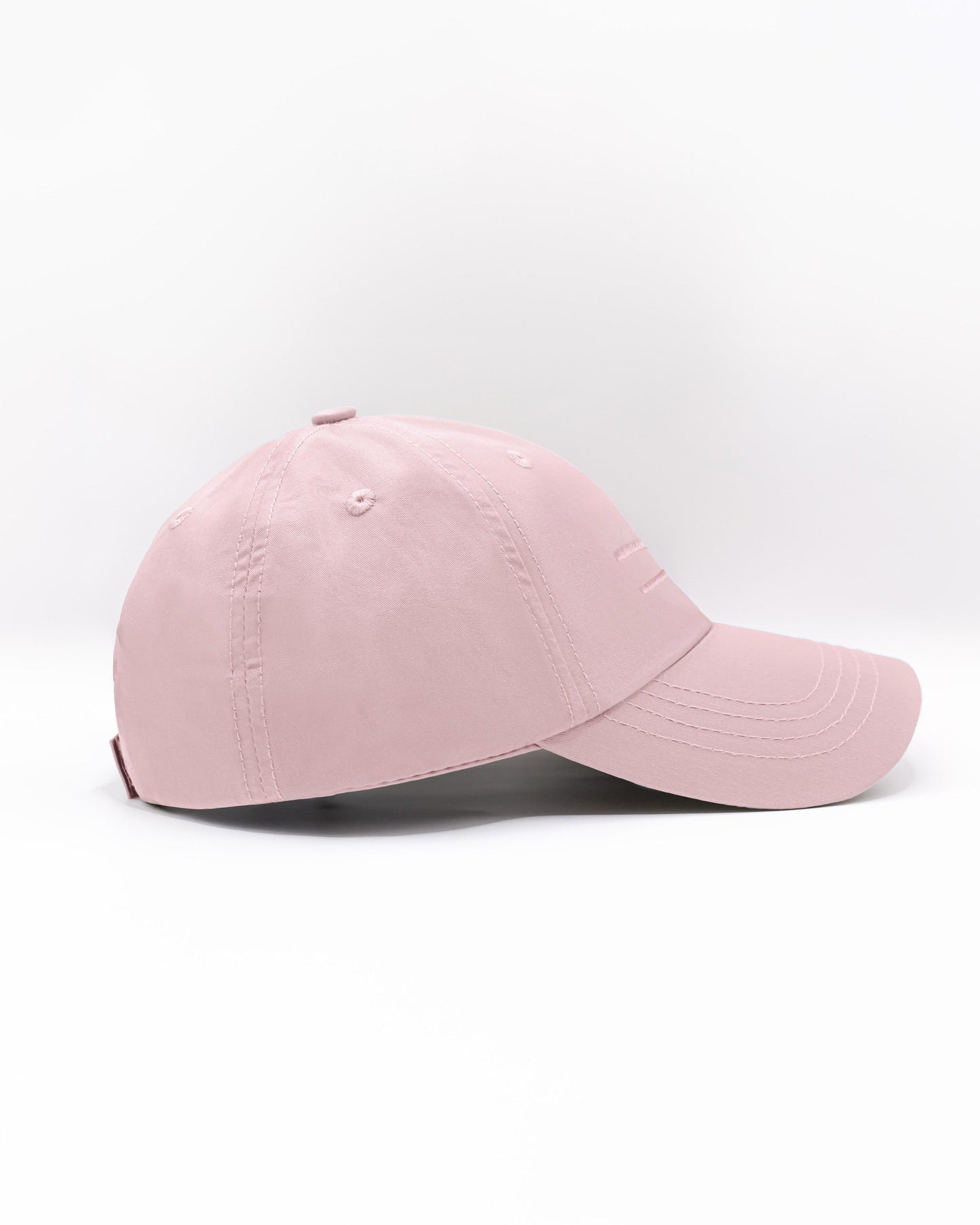 DC2 Resort Cap in Leisure Pink — side view showing the low-profile fit and smooth cotton twill finish.