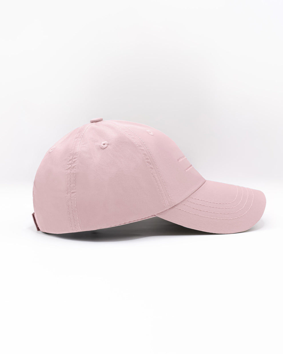 DC2 Resort Cap in Leisure Pink — side view showing the low-profile fit and smooth cotton twill finish.