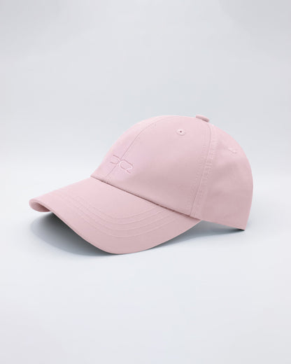 DC2 Leisure Pink Resort Cap — angled view emphasizing the curved brim, clean stitching, and subtle DC2 embroidery.