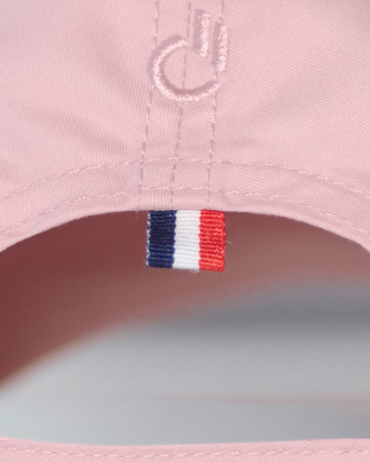 Back detail of the DC2 Resort Cap in Leisure Pink — featuring tonal stitching and a woven tricolor accent tab.
