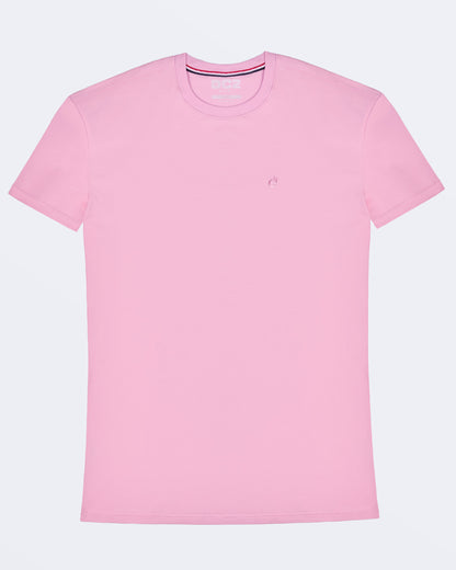 A male model wearing a light pink color modal cotton t-shirt, crafted for stylish casual wear and beachwear by DC2 Miami. Premium quality men's streetwear t-shirt, perfect fit for summer fashion.