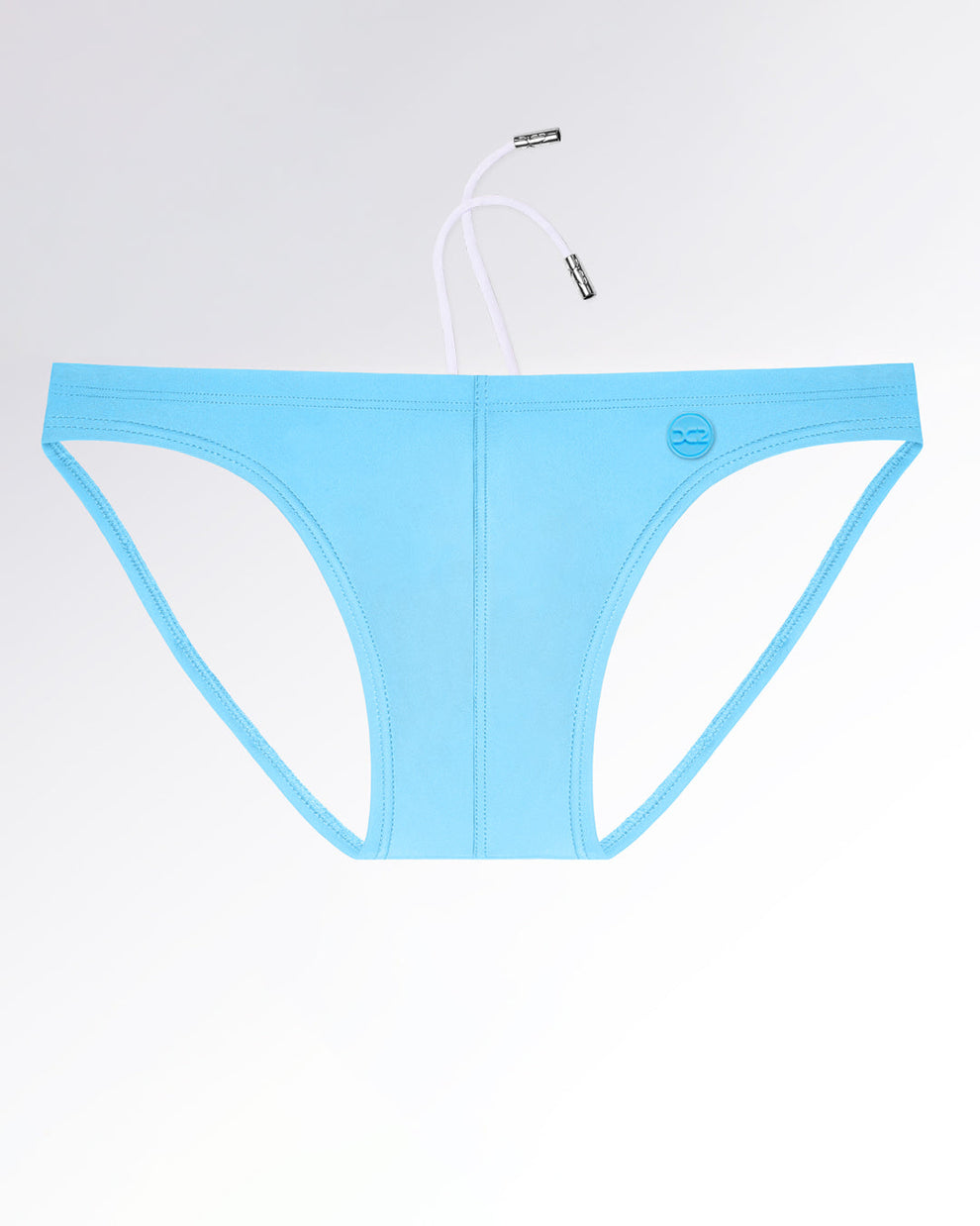 DC2 Magnet Blue — model wearing Swim Mini Briefs, featuring a sleek fit with minimal coverage and bold color.