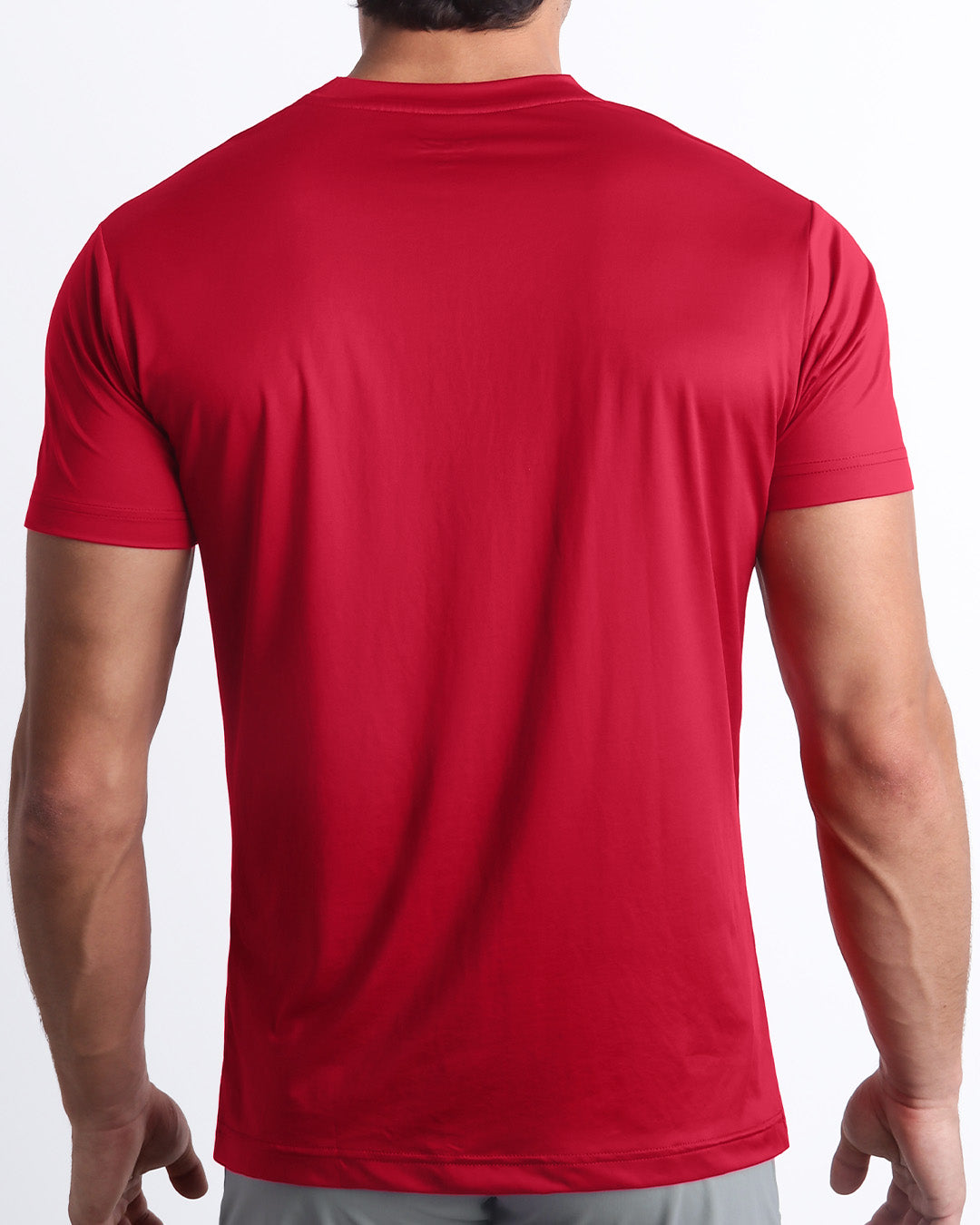 Back view of the MAJESTIC RED men's fitness shirt in a red color. These premium quality quick-dry t-shirts are DC2 by BANG! Clothes, a men’s beachwear brand from Miami.