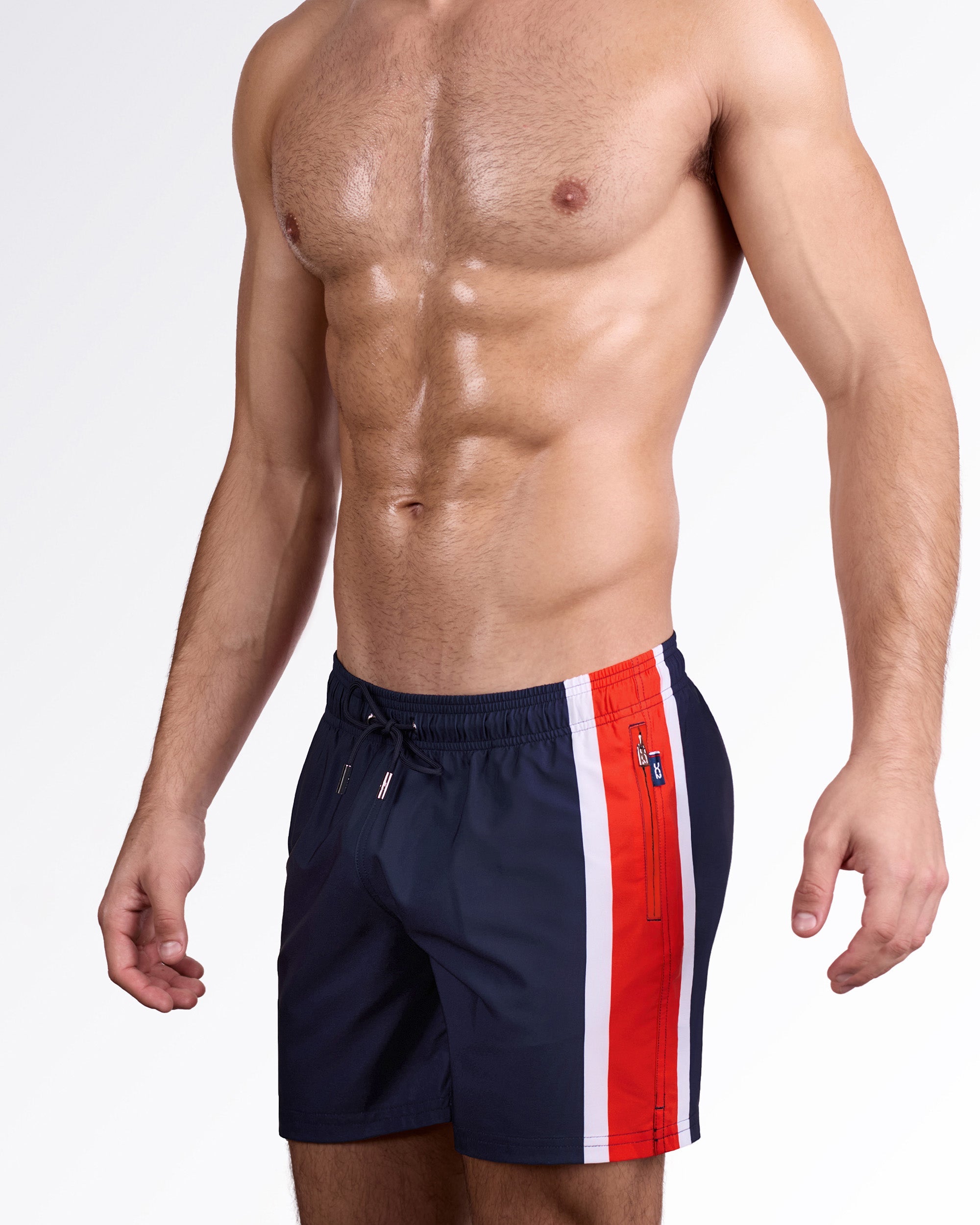 DC2 Miami Maritime Resort Shorts — angled side view highlighting the navy body, red and white stripe detail, and zip pocket.