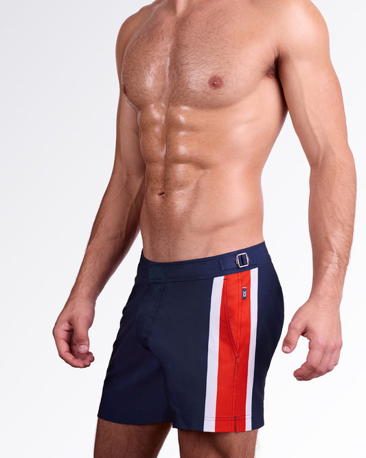 DC2 Miami Maritime Tailored Shorts — side view highlighting navy tailored shorts with red and white stripe panel and adjustable side buckle detail.
