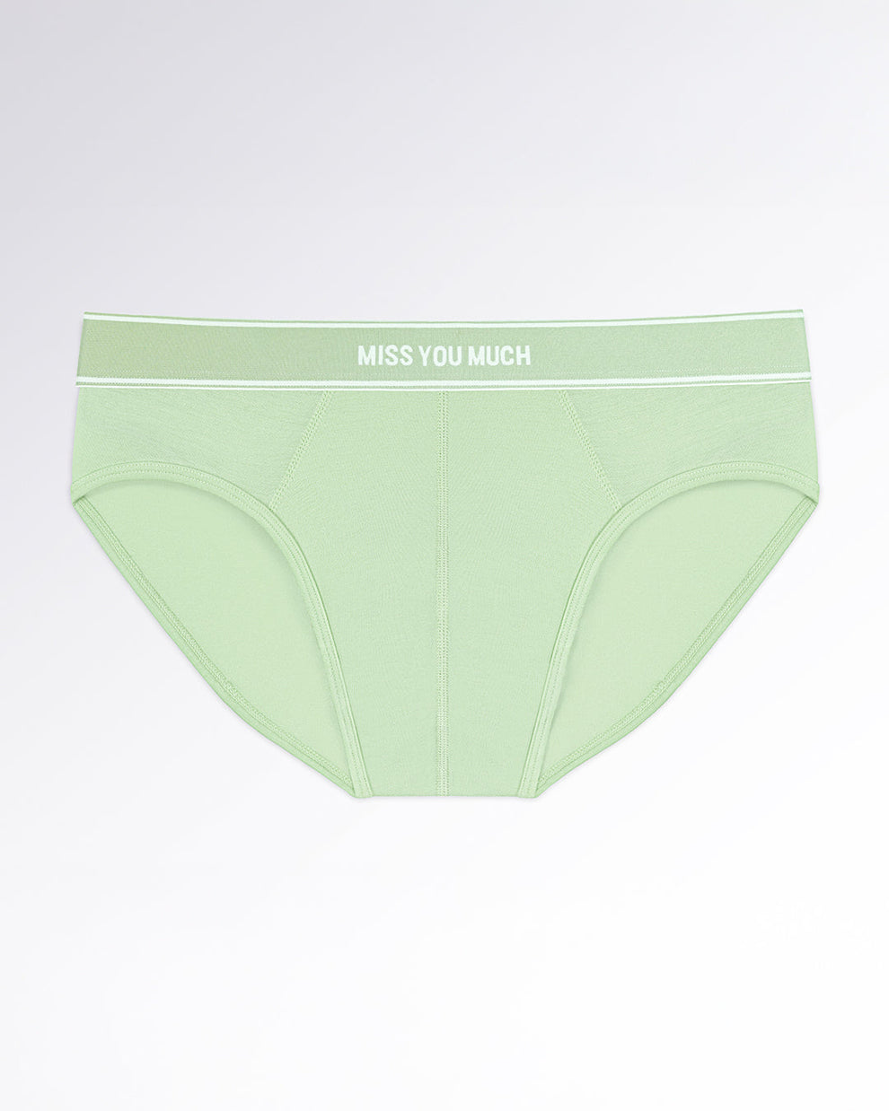 MISS YOU MUCH Modal Briefs — flatlay of soft mint-green men’s modal briefs with a contoured pouch and elastic waistband featuring white text detailing.