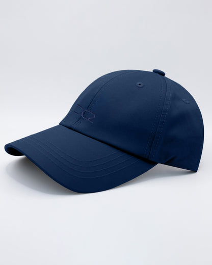 DC2 Resort Cap in Navy Blue — angled view emphasizing the curved brim, clean stitching, and minimal DC2 embroidery.