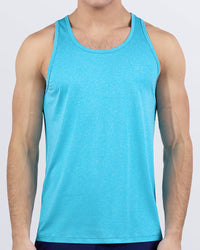 DC2 Miami Olympic Blue Tank Top — model wearing fitted tank in Olympic blue, soft stretch fabric with scoop neckline and minimal chest logo.