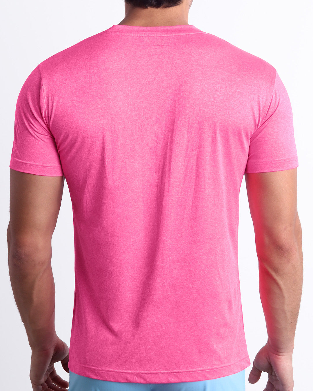 Back view of the PINKTENSITY men's fitness shirt in a hot pink color. These premium quality quick-dry t-shirts are DC2 by BANG! Clothes, a men’s beachwear brand from Miami.