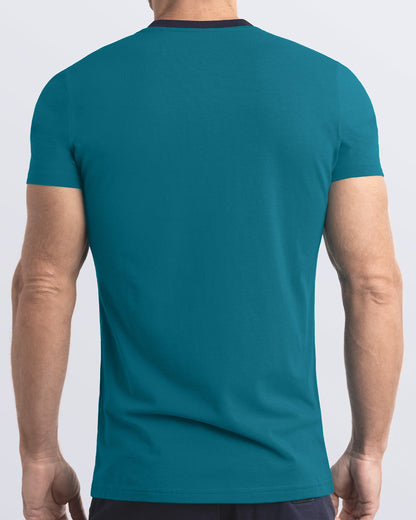 Back view of a vibrant teal men's t-shirt with a striking dark blue collar, made from soft, durable and breathable Pima cotton. Part of the DC2 Miami men's streetwear and beachwear collection, ideal for casual summer outfits.