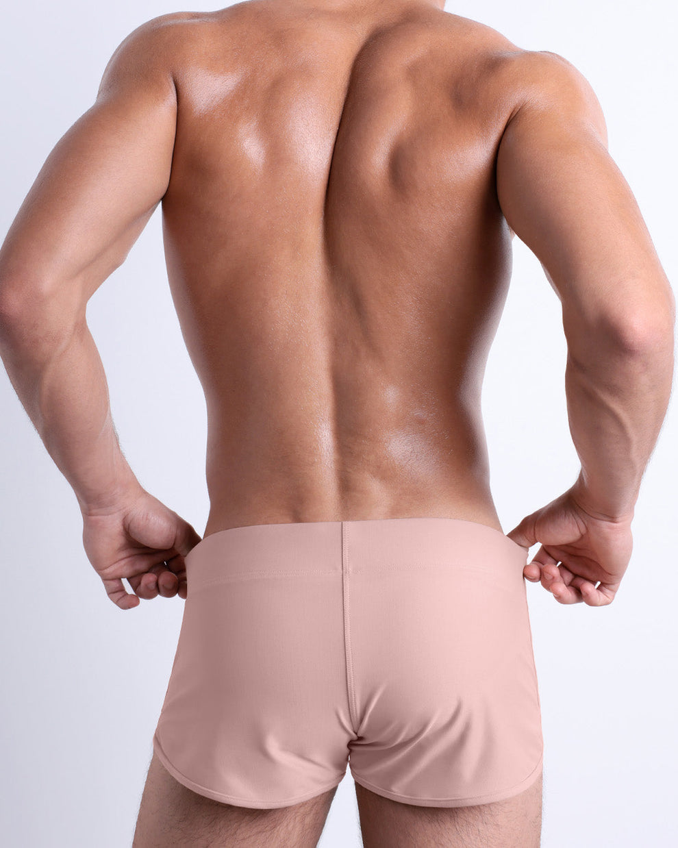 DC2 Fair/Naked Pink Swim Shorts — back view featuring seamless design and sculpted shape.