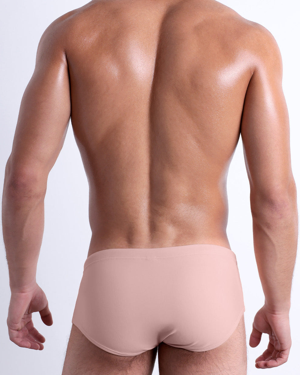 Back view of SKINNY DIP (Fair Pink) Swim Sunga — Brazilian fit with smooth stretch and clean seams.