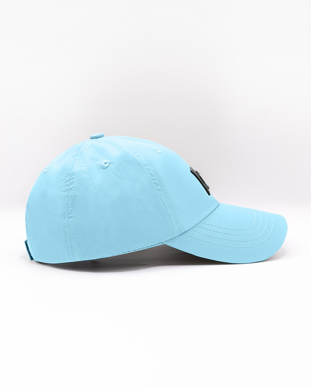 Side view of the SKY BLUE Chillax baseball cap, showcasing its sleek and minimalist design. The cap features a light blue color, durable stitching, and a curved brim, perfect for casual and streetwear styles. Made for comfort and style, this dad hat is ideal for everyday wear, whether at the beach or on the streets.