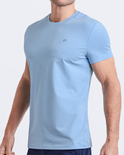 Side view of a men's premium light blue modal cotton t-shirt and embroidered DC2 logo. Perfect for a modern casual look, this streetwear tee is part of the DC2 Miami men's beachwear collection, designed for comfort and style.