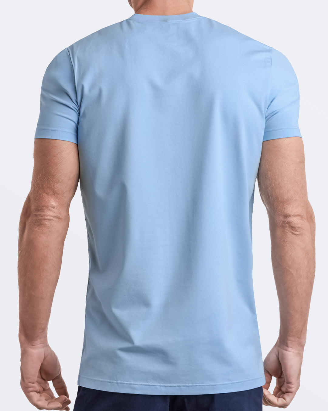 Back view of a sky blue men's t-shirt, made from soft, durable and breathable modal cotton. Part of the DC2 Miami men's streetwear and beachwear collection, ideal for casual summer outfits.