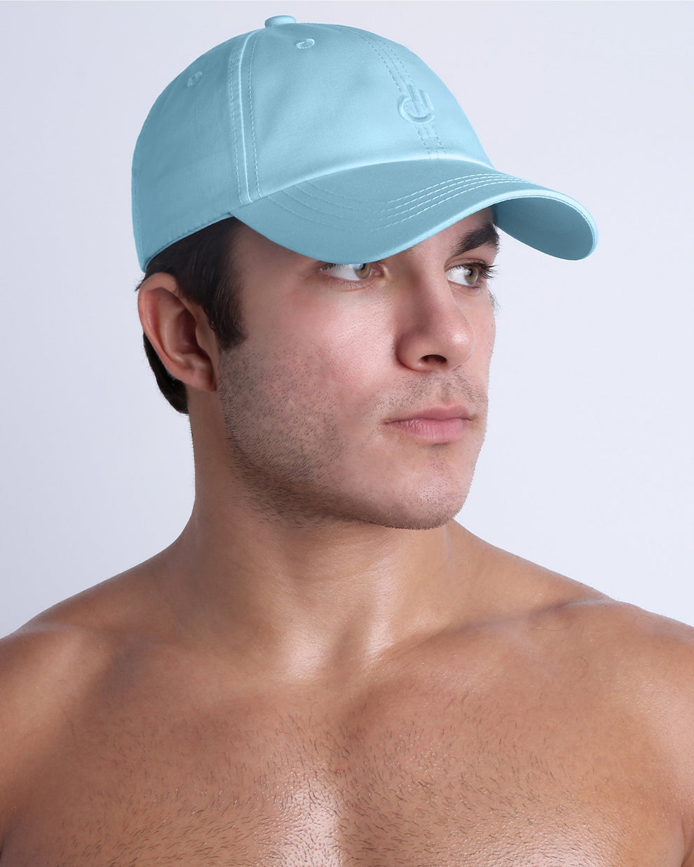DC2 sky blue resort cap on model, curved brim baseball cap with a clean, modern fit.