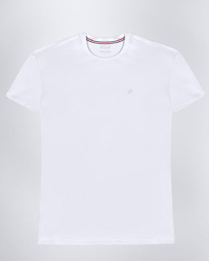 Frontal view of a male model wearing a solid white color modal cotton t-shirt, crafted for stylish casual wear and beachwear by DC2 Miami. Premium quality men's streetwear t-shirt, perfect fit for summer fashion.