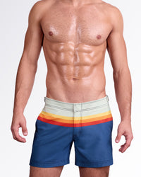 DC2 Miami Sunset Stripes Tailored Shorts — front view of tailored shorts with a light grey waistband, horizontal sunset stripe detail, and deep blue base.