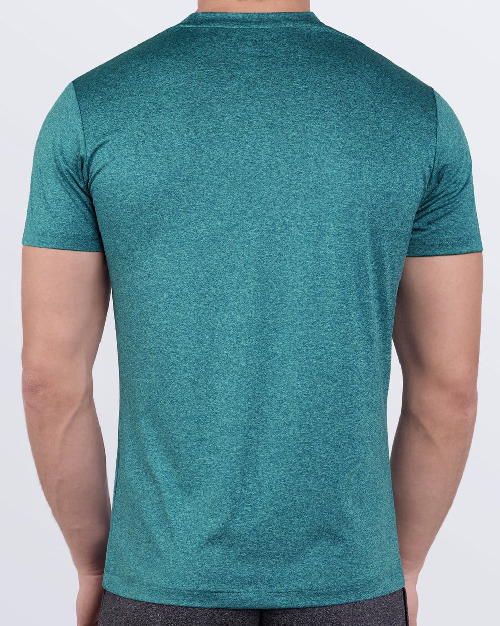 DC2 Trainer Teal Fitness T-Shirt — back view highlighting moisture-wicking quick-dry fabric and muscle-accentuating fit.