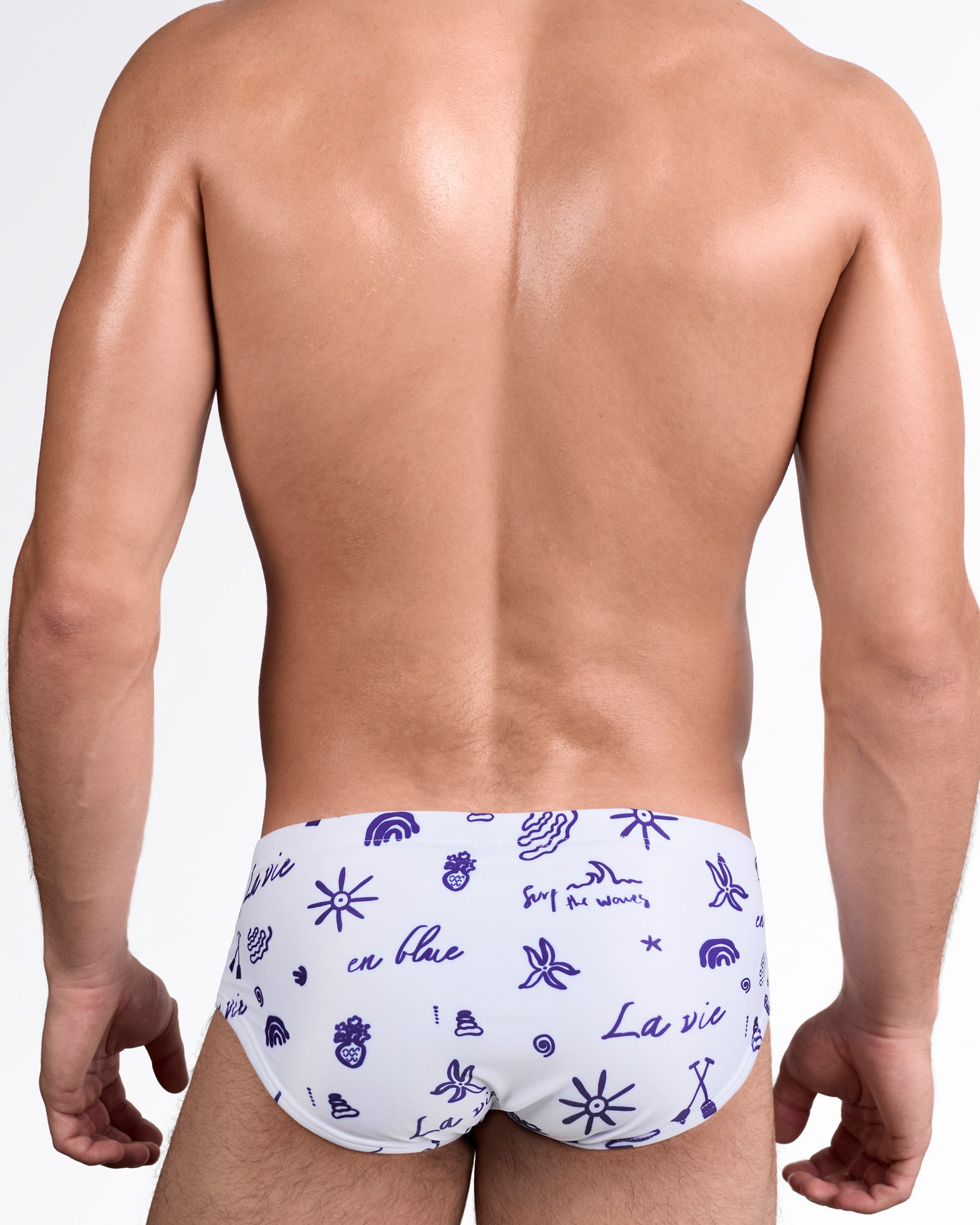 DC2 Viva La Vida (Blue) Swim Sunga — back view showing full coverage rear and all-over blue graphic motifs against the white background.