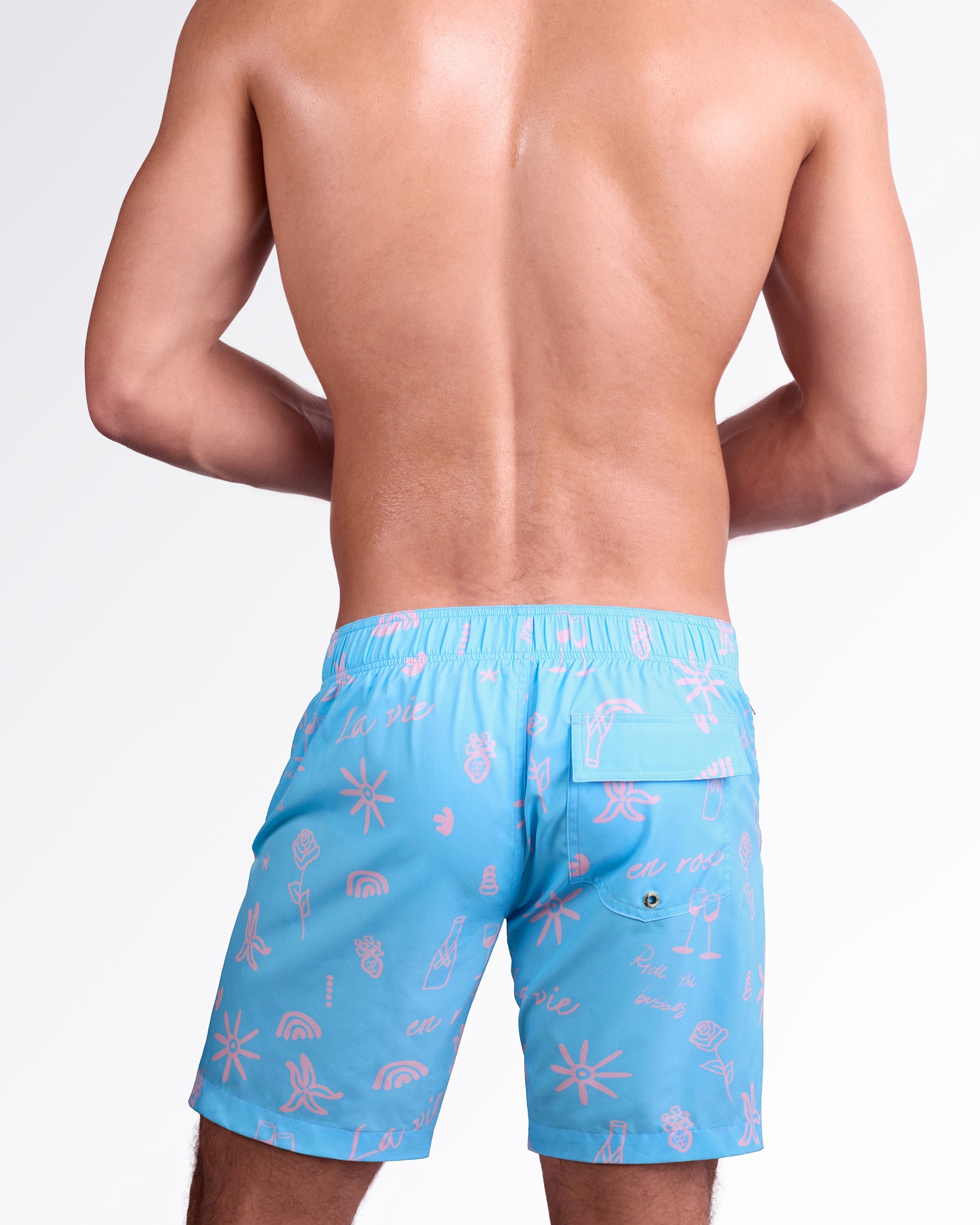 DC2 Miami Viva La Vida (En Rose) Flex Boardshorts — back view highlighting elastic waistband, rear flap pocket, and all-over pink “La vie en rose” inspired print on lightweight quick-dry fabric.